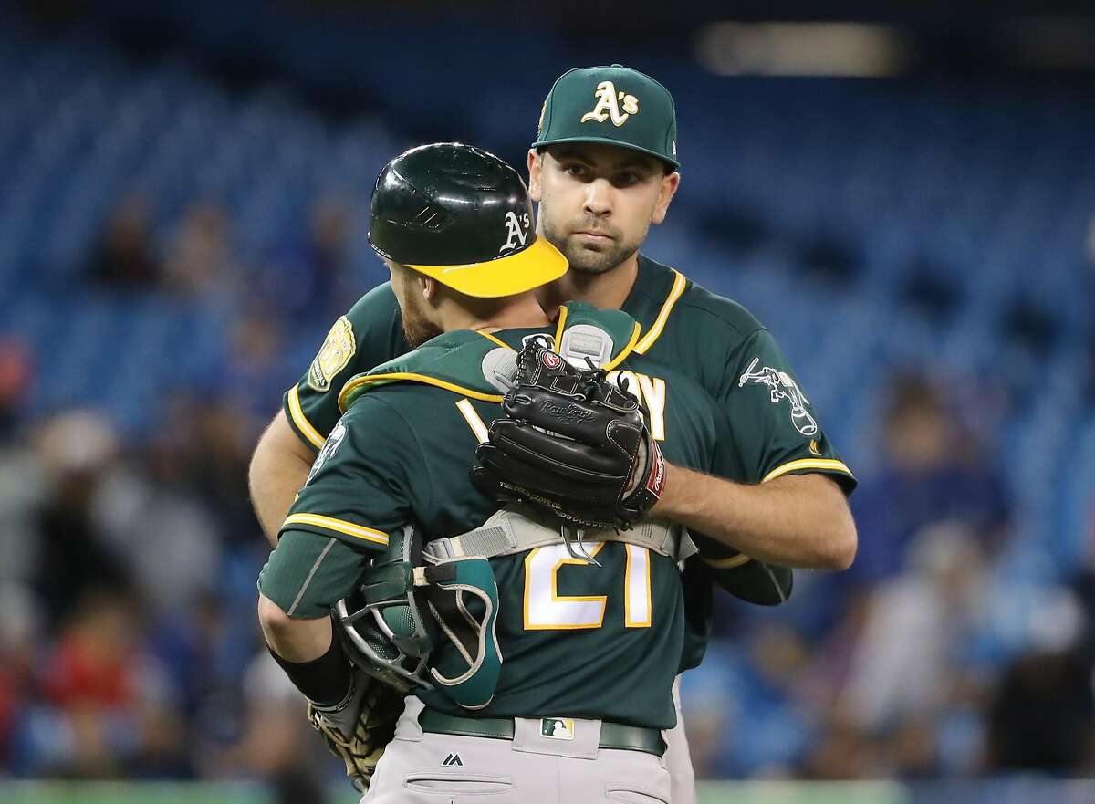 Oakland Athletics relief pitcher Lou Trivino rides the bullpen