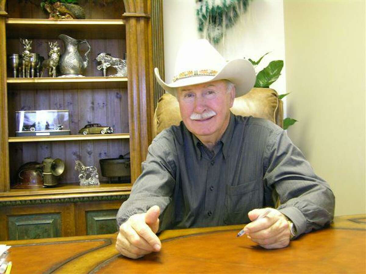 San Antonio real estate investor James F. Cotter is shown in 2007 after he bought the twin Alamo Towers office buildings in San Antonio.