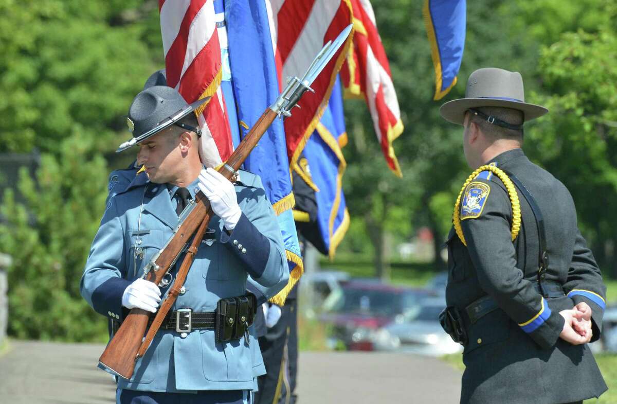 Color Guards from all over the state and out of state make their way into the funeral service for Connecticut State Trooper First Class Walter Greene Jr. at Sherwood Island State Park on Tuesday June 12, 2018 in Westport Conn.