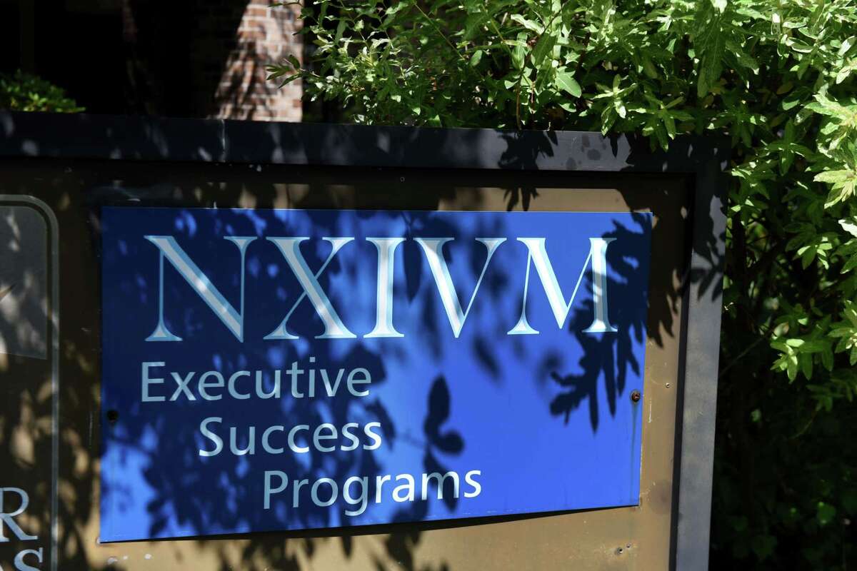 Exterior sign at the NXIVM offices on New Karner Rd. on Tuesday, June 12, 2018, in Colonie, N.Y. NXIVM announced it was suspending all operations and planned events. (Will Waldron/Times Union)
