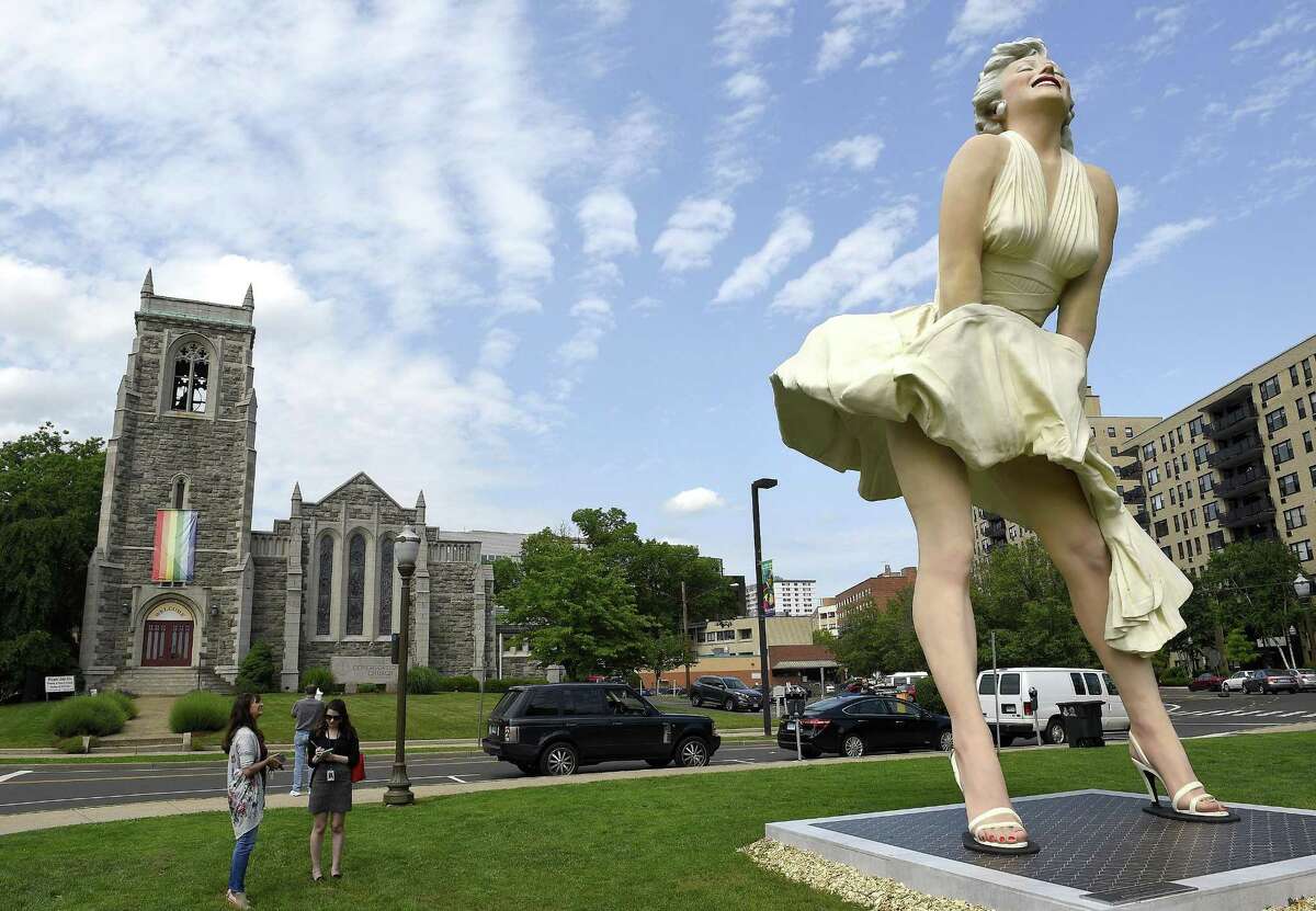 Seward Johnson’s "Forever Marilyn" sculpture in Latham Park in Stamford, Conn. The 26-foot statue that was newly installed in the park is scandalizing some because her rear end is facing the entrance of the First Congregational Church.