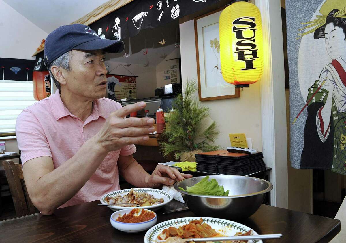 Jay Lim, 62, owner of Edo II in Danbury, a restaurant that serves Korean and Japanese food, weighs in Tuesday, June 12, 2018, on the Trump-Kim summit. Lim is an immigrant from South Korea.