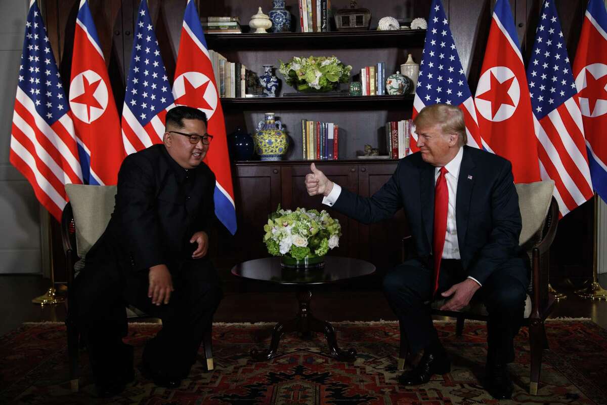 President Donald Trump meets with North Korean leader Kim Jong Un on Sentosa Island, Tuesday, June 12, 2018, in Singapore.