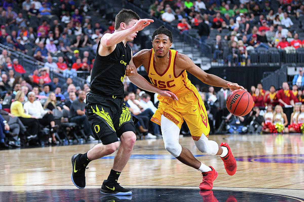 OLLEGE BASKETBALL: MAR 09 PAC-12 Tournament - Oregon v USC LAS VEGAS, NV - MARCH 9: USC guard Elijah Stewart (30) drives to the basket during the semifinal game of the mens Pac-12 Tournament between the Oregon Ducks and the USC Trojans on March 9, 2018, at the T-Mobile Arena in Las Vegas, NV. (Photo by Brian Rothmuller/Icon Sportswire via Getty Images)