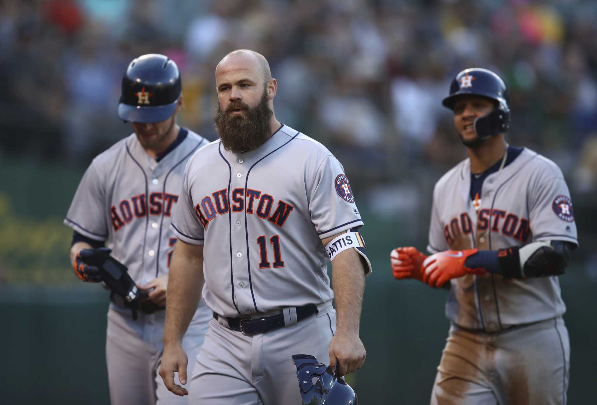 Astros' Evan Gattis suffers minor injury against Oakland