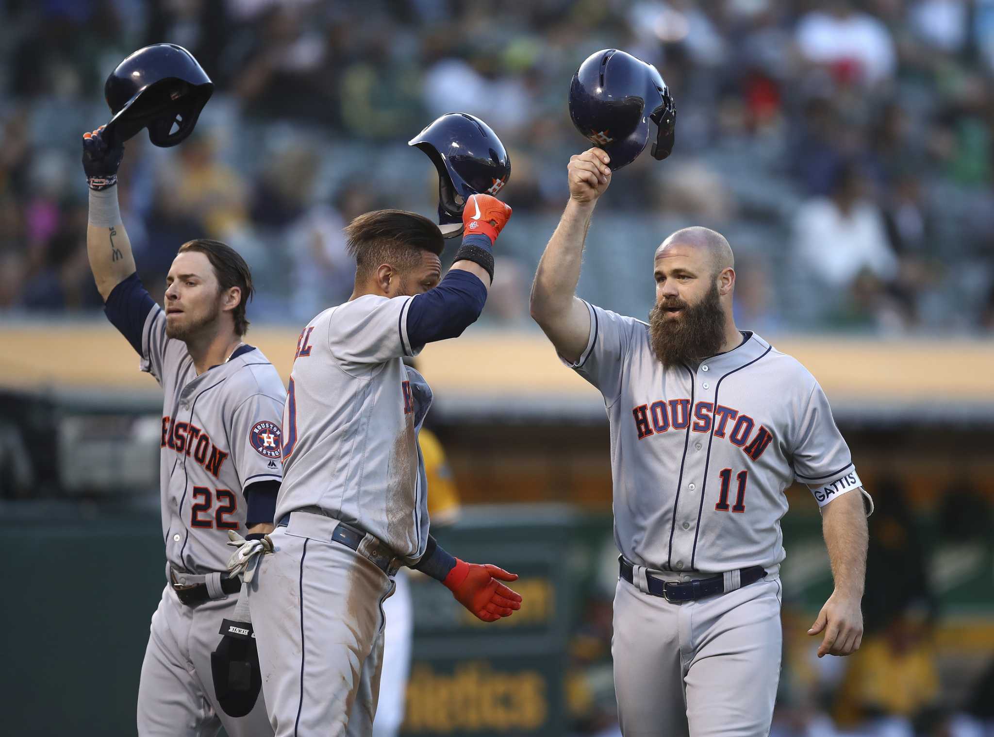 Astros' Evan Gattis suffers minor injury against Oakland