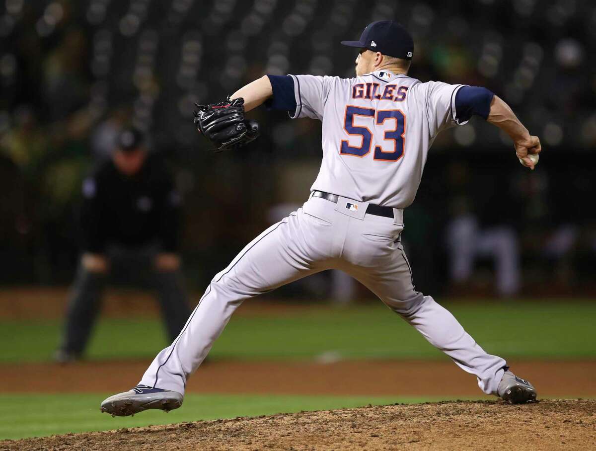 Houston Astros pitcher Ken Giles works against the Oakland Athletics during the ninth inning of a baseball game Tuesday, June 12, 2018, in Oakland, Calif. (AP Photo/Ben Margot)