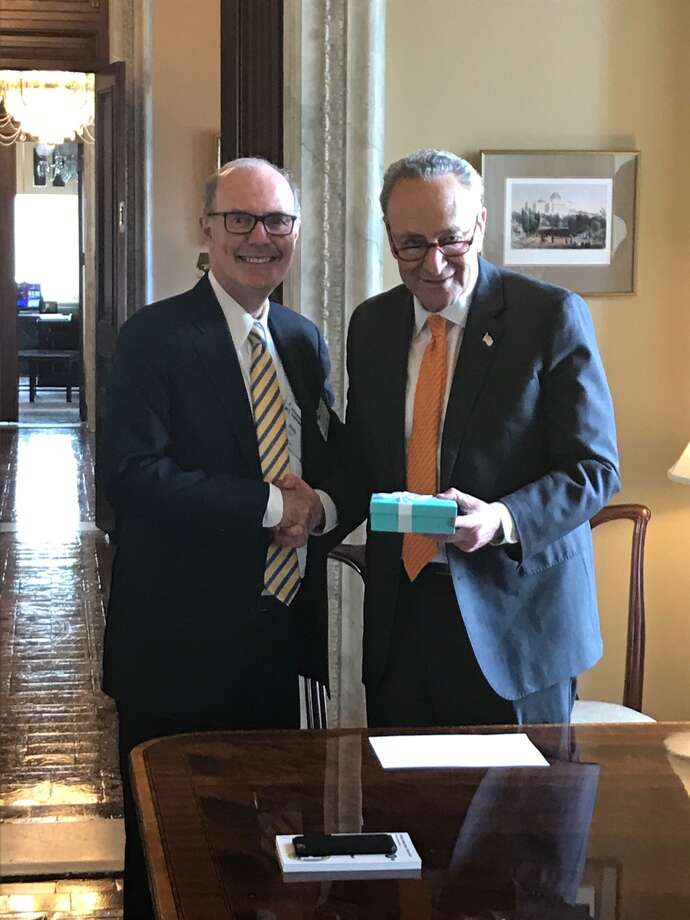 Plug Power CEO Andy Marsh, left, with U.S. Sen. Chuck Schumer of New York in Washington, D.C. Marsh presented Schumer with a special award for pushing through a tax credit on fuel cell purchases. Photo: Plug Power