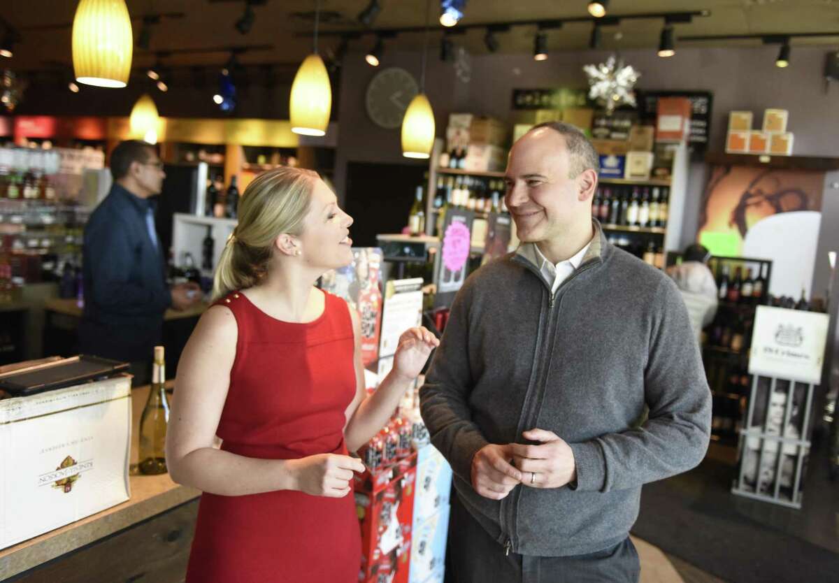 Bom Bom founder Eva Maria Janerus and Kevin Mowers in February 2018, with bottles of Bom Bom Coco Mochanut and Nilli Vanilli at A1 Cellars Wine and Spirits in Greenwich, Conn.