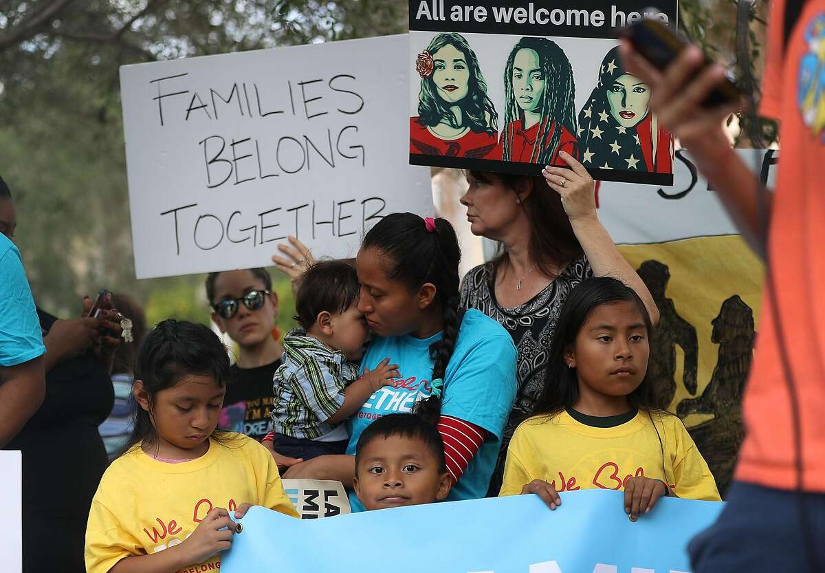 MIRAMAR, FL - JUNE 01: Protesters join together during a rally in front of the Miramar ICE detention facility on the National Day of Action for Children on June 1, 2018 in Miramar, Florida. The day of action was held to ask the Trump administration to keep families together as they seek legal status in the U.S. (Photo by Joe Raedle/Getty Images)
