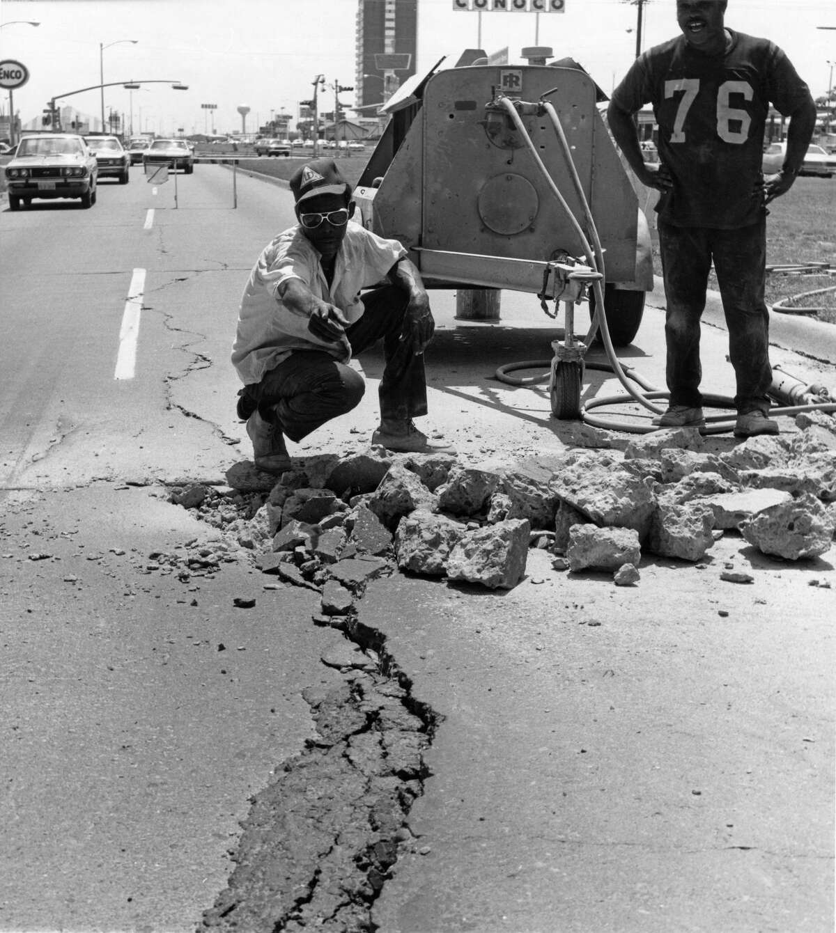 June 1972: This pavement, buckled by heat, is on Bellaire near Fondren. John C. Jones, a hammer operator for the City of Houston, and a crew of workers were on the job repairing it. A spokesman for the City Public Works Department, said widespread buckling by heat usually occurs toward the end of the summer.