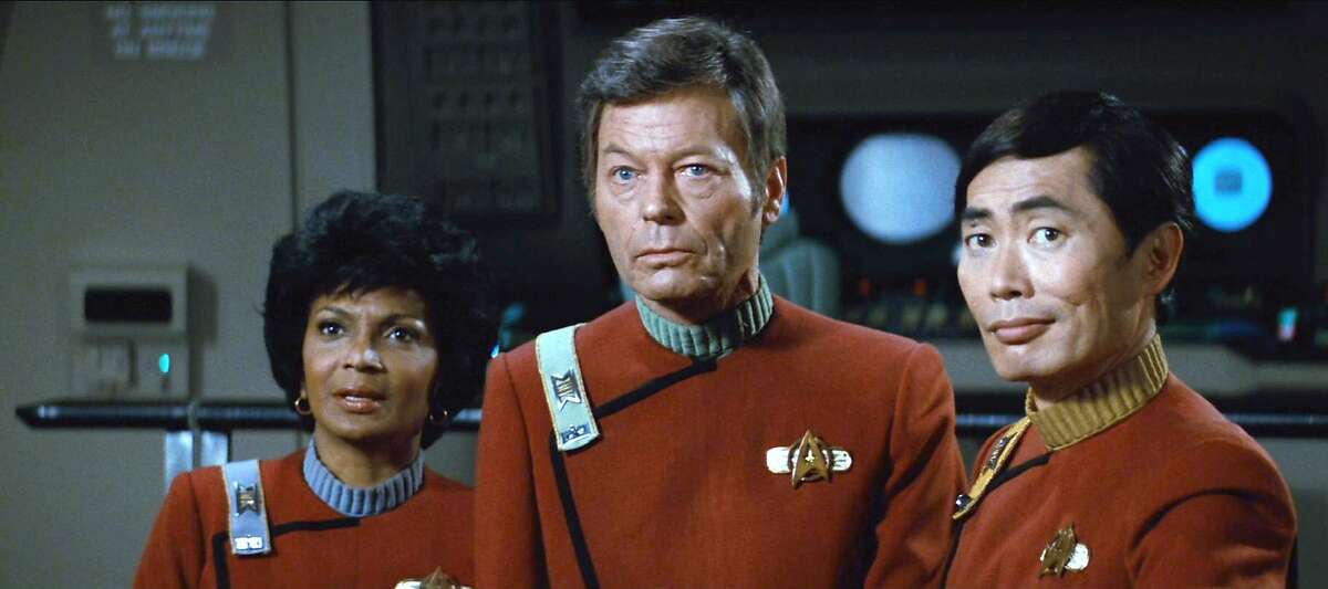 Screengrab featuring (from left) Nichelle Nichols as Commander Uhura, DeForest Kelley as Dr. Leonard "Bones" McCoy and George Takei as Commander Hikaru Sulu in the movie, "Star Trek II: The Wrath of Khan."