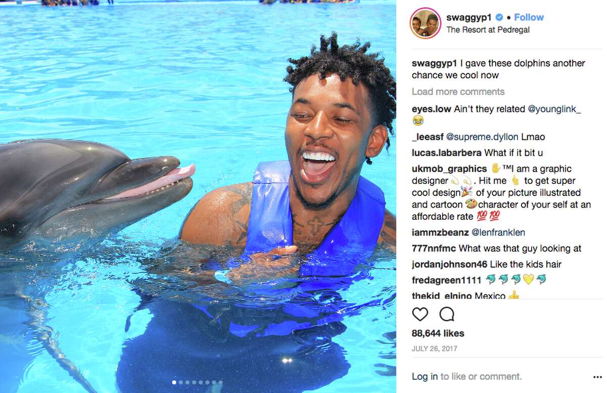 Favorite vacation spots of the Golden State Warriors Nick Young loves family trips to Mexico, including this fun 2017 excursion to Cabo San Lucas. The dolphin meet-and-greet allowed Swaggy P to make peace with the ocean creature. While with the Lakers, Young said a "dolphin tried to kill" him. "It was my turn to ride the dolphin, and for some reason he took me all the way to the bottom so um, he was trying to drown me," Young said. He is now "cool" with dolphins.