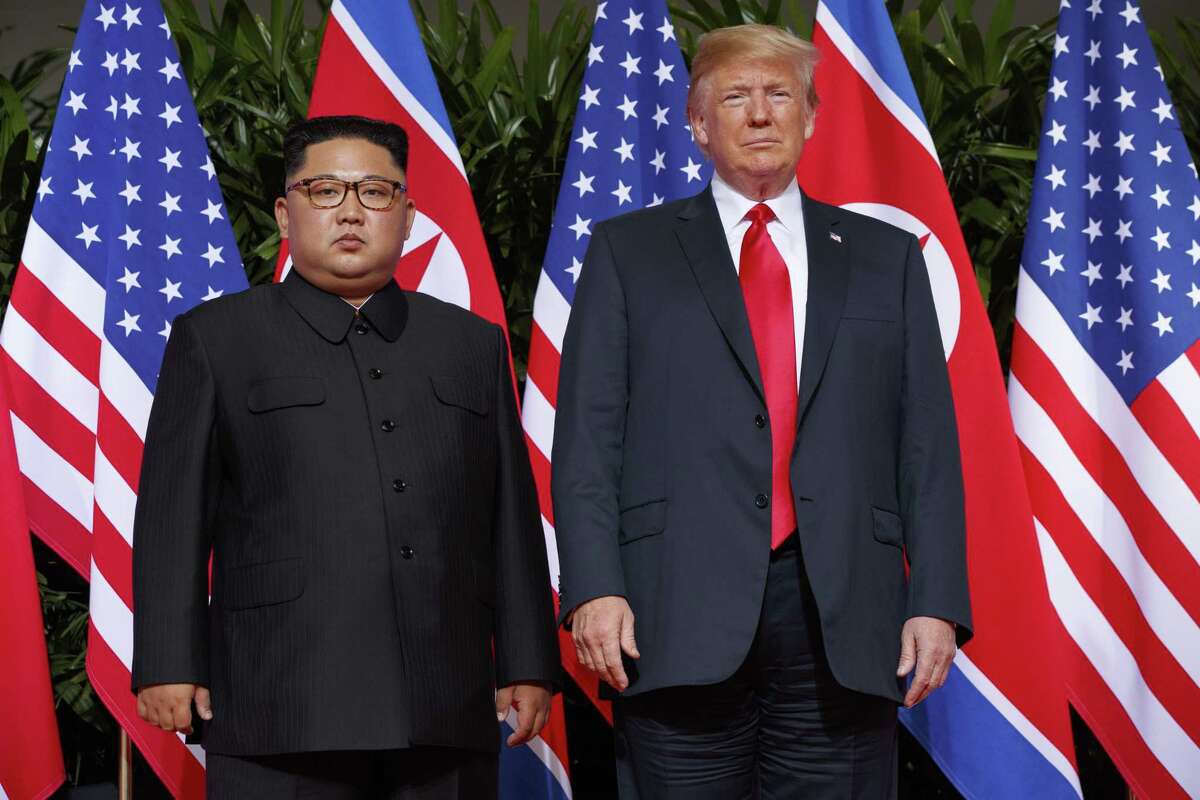 President Donald Trump meets with North Korean leader Kim Jong Un on Sentosa Island, in Singapore on Tuesday. President Donald Trump had previously condemned the cruelty of North Koreas government, but after his historic summit on Tuesday with North Korean leader Kim Jong Un, Trump seemed to play down the severity of human rights violations in North Korea.