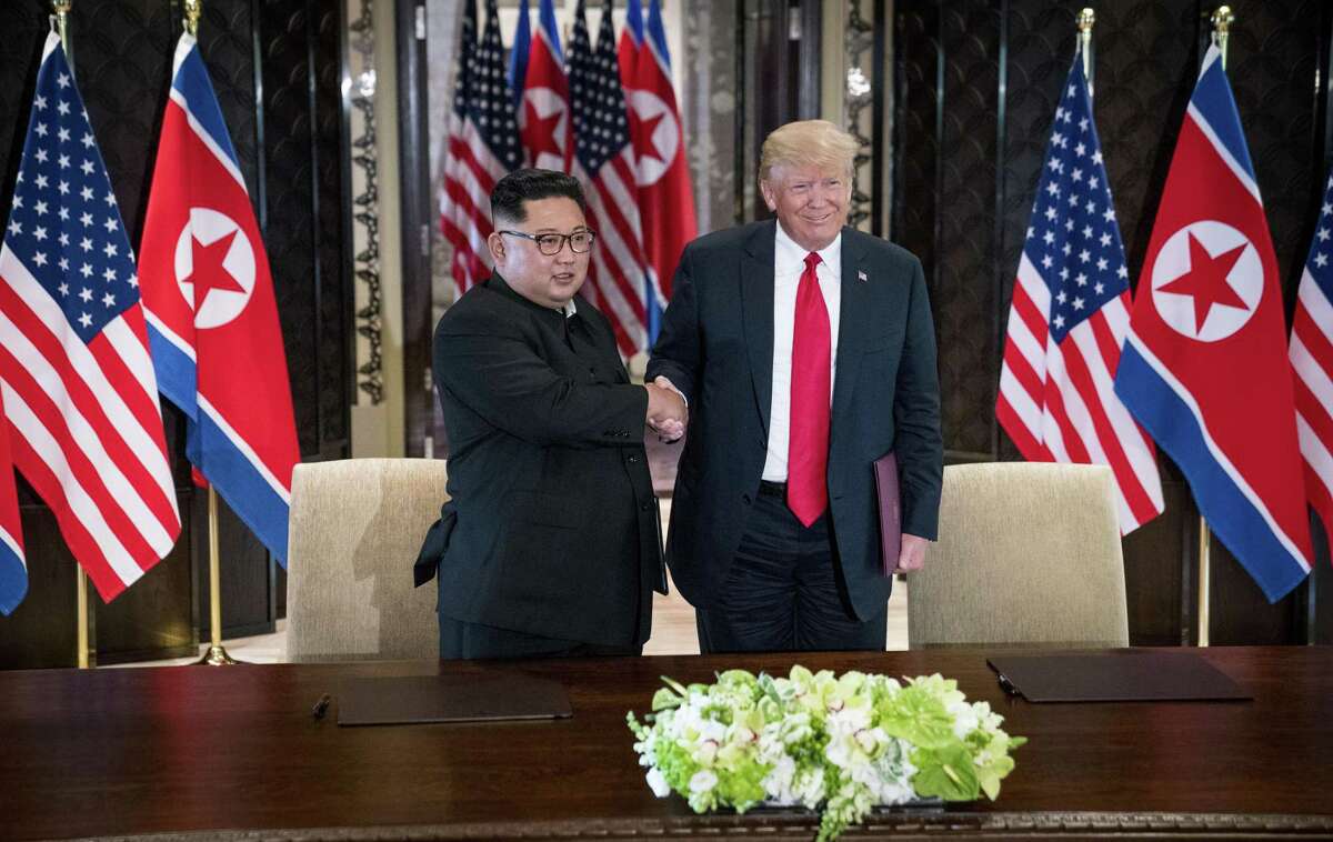 President Donald Trump and Kim Jong Un of North Korea during a signing ceremony on Sentosa Island in Singapore, June 12, 2018.