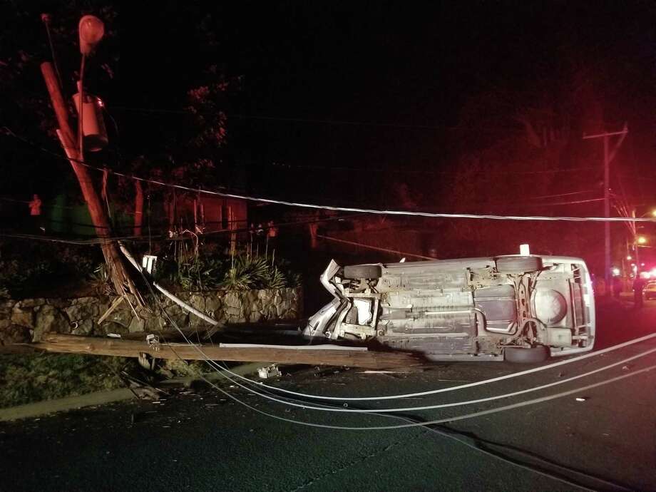 A motorist was extricated from their vehicle late Thursday after smashing into a utility pole on Town Hill Avenue. Photo: / Contributed