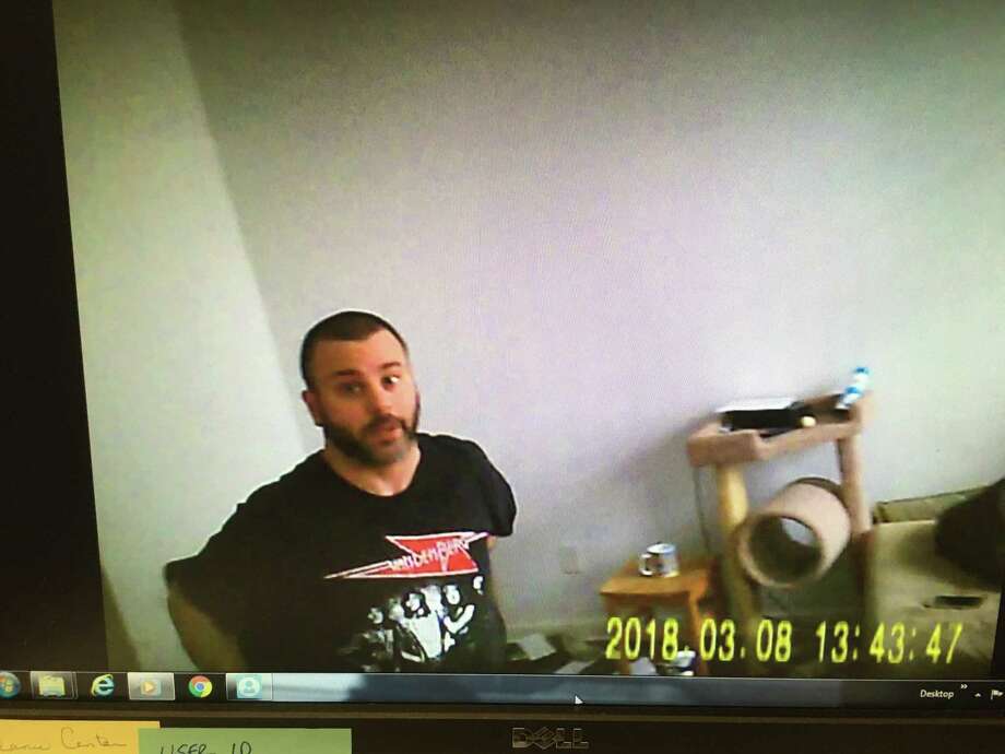 A screen grab from a police video taken by a confidential informant during a drug buy at Matthew Kirshner's Cohoes apartment in March. Kirshner, shown in black T-shirt, pleaded gulty to one felony count of attempted sale of a controlled substance, which will be reduced to a misdemeanor possession charge if he completes court-ordered treatment. (Courtesy Albany County Sheriff's Deaprtment.)