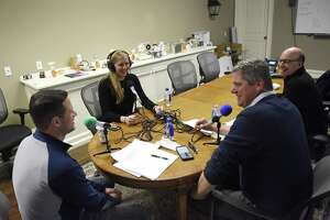 Hearst Connecticut Media business reporter Macaela Bennett interviews Tri-State LED Lighting President Ron Young, left, Vice President Bob Ostrander, center, and CFO Brooke Wagner during a recording of the new Rally podcast at Tri-State LED in the Byram section of Greenwich, Conn. Wednesday, April 4, 2018. Bennett is recording and producing a new podcast in which business people describe the challenges they've encountered in their rise to success.