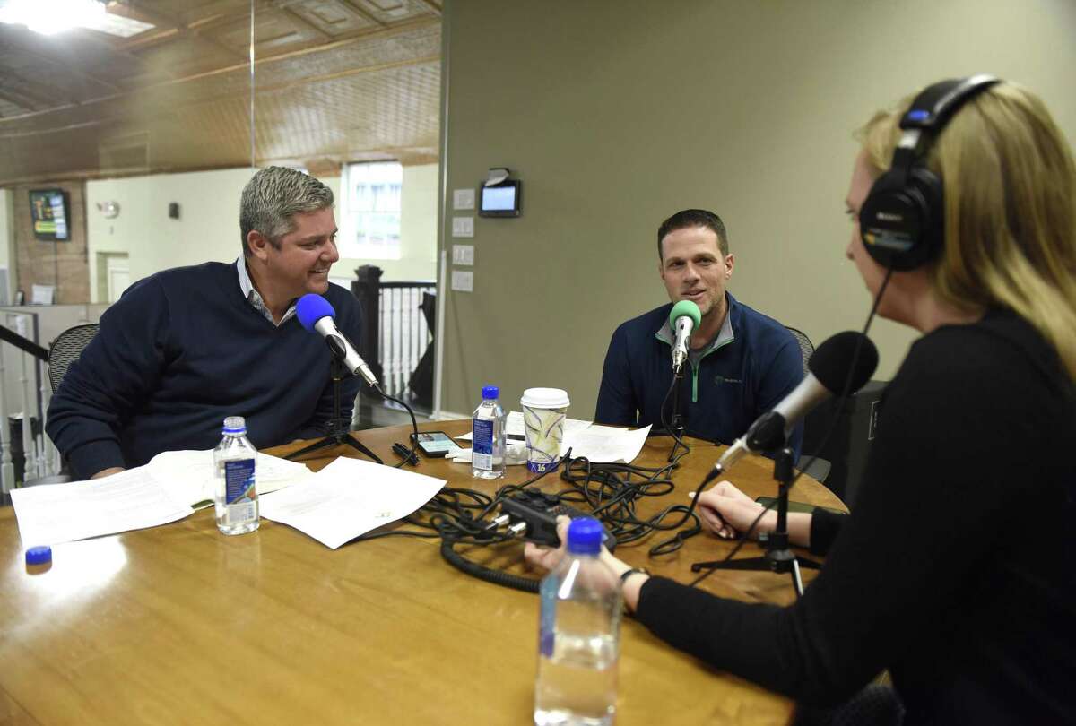 Tri-State LED Lighting Vice President Bob Ostrander, left, and President Ron Young chat with Hearst Connecticut Media business reporter Macaela Bennett during a recording of the new Rally podcast at Tri-State LED in the Byram section of Greenwich, Conn. Wednesday, April 4, 2018. Bennett is recording and producing a new podcast in which local business people describe the challenges they've encountered in their rise to success.