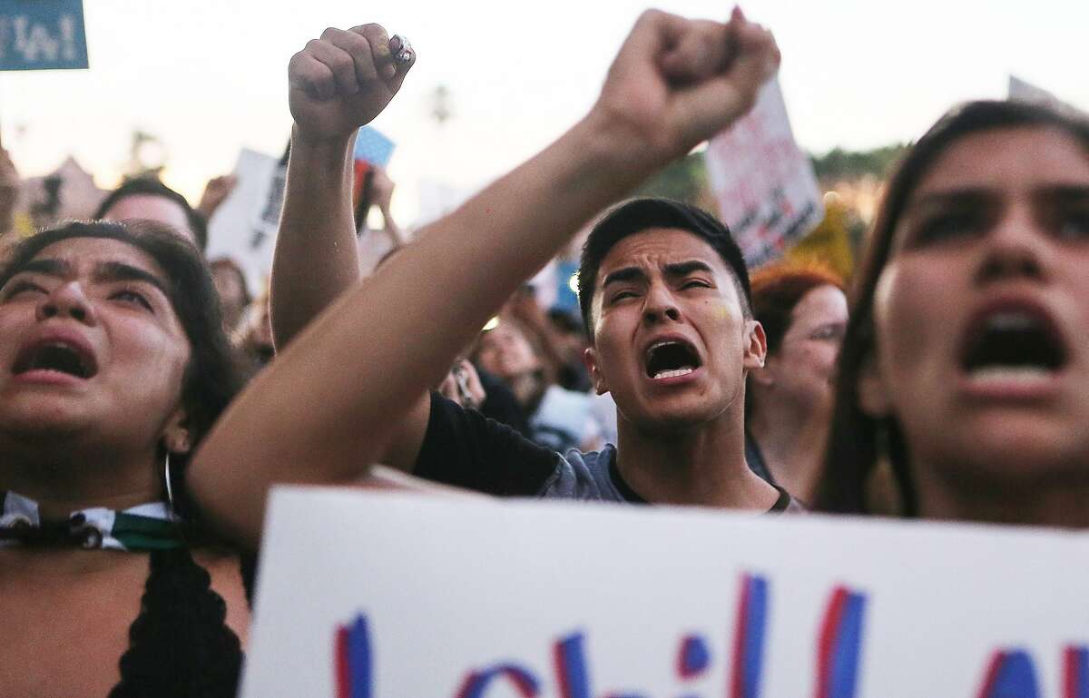 LOS ANGELES, CA - JUNE 14: Protestors chant at the 'Families Belong Together March' against the separation of children of immigrants from their families on June 14, 2018 in Los Angeles, California. Demonstrators marched through the city and culminated the march at a detention center where ICE (U.S.Immigration and Customs Enforcement) detainees are held. U.S. Immigration and Customs Enforcement recently arrested 162 undocumented immigrants during a three-day operation in Los Angeles and surrounding areas. (Photo by Mario Tama/Getty Images)