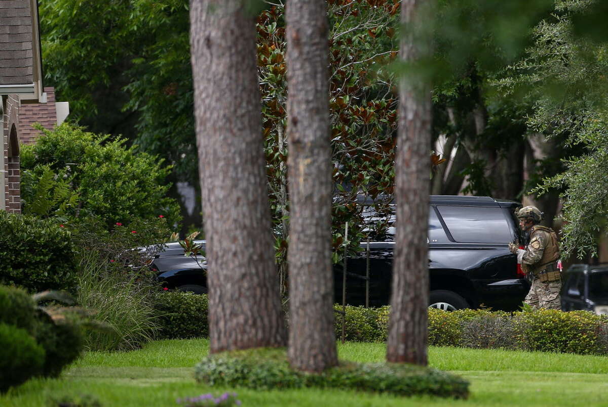 Authorities at the scene where a man is barricaded inside his home on the 5700 block of Ariel Street Friday, June 15, 2018, in Houston.