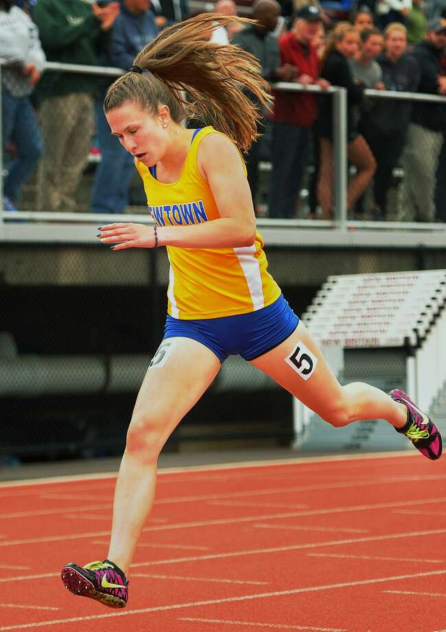 Newtown's Carly Swierbut crosses the finish line to win the girls 400 meters at the CIAC Track & Field Championships in New Britain, Conn. on Monday, June 4, 2018. Photo: Brian A. Pounds / Hearst Connecticut Media / Connecticut Post
