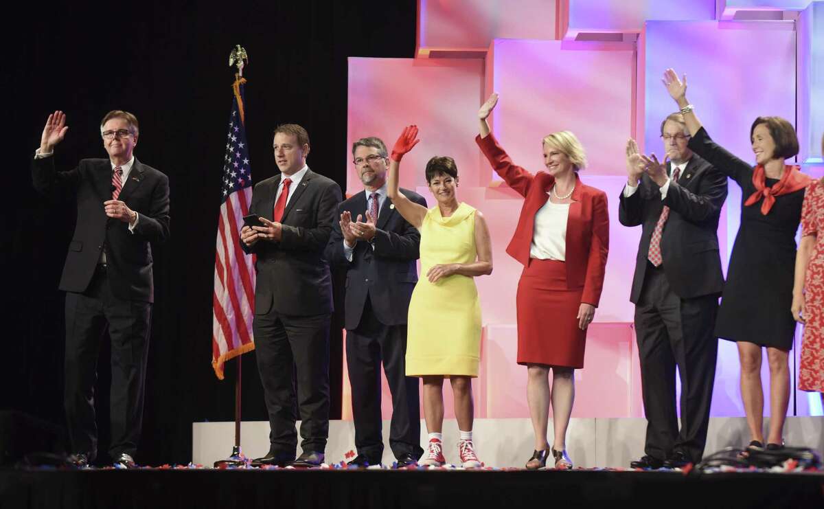 Republican state representatives join Lt. Gov. Dan Patrick, left, onstage at the Republican Party of Texas convention at the Henry B. Gonzalez Convention Center on Friday, June 15, 2018.