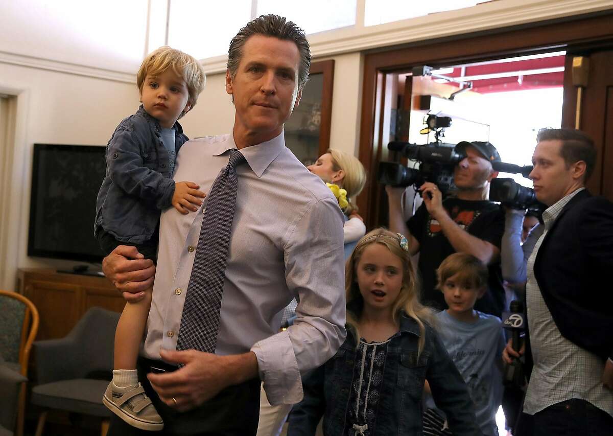 LARKSPUR, CA - JUNE 05: Democratic gubernatorial candidate Lt. Gov. Gavin Newsom (C) walks with his kids Dutch, (L) Montana (2R) and Hunter (R) before voting at the Masonic Temple Fairfax on June 5, 2018 in Larkspur, California. California Lt. Gov. Gavin Newson cast his ballot as California voters are heading to the polls to vote in the primary election. Newsom is expected to claim the top spot in the California gubernatorial primary election ahead of republican candidate John Cox and former Los Angeles mayor Antonio Villaraigosa, a democrat. (Photo by Justin Sullivan/Getty Images)