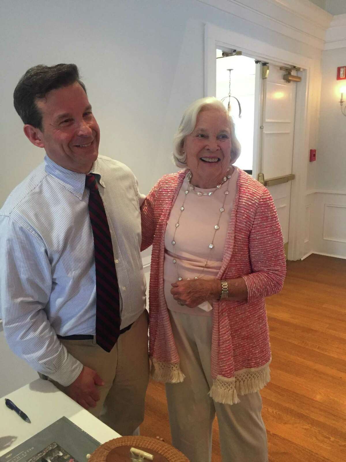 Greenwich resident and author Matt Bernard meets with Belle Haven resident Judy Higgins, his former neighbor, at a book signing to benefit Community Centers Inc. at the Belle Haven Club.