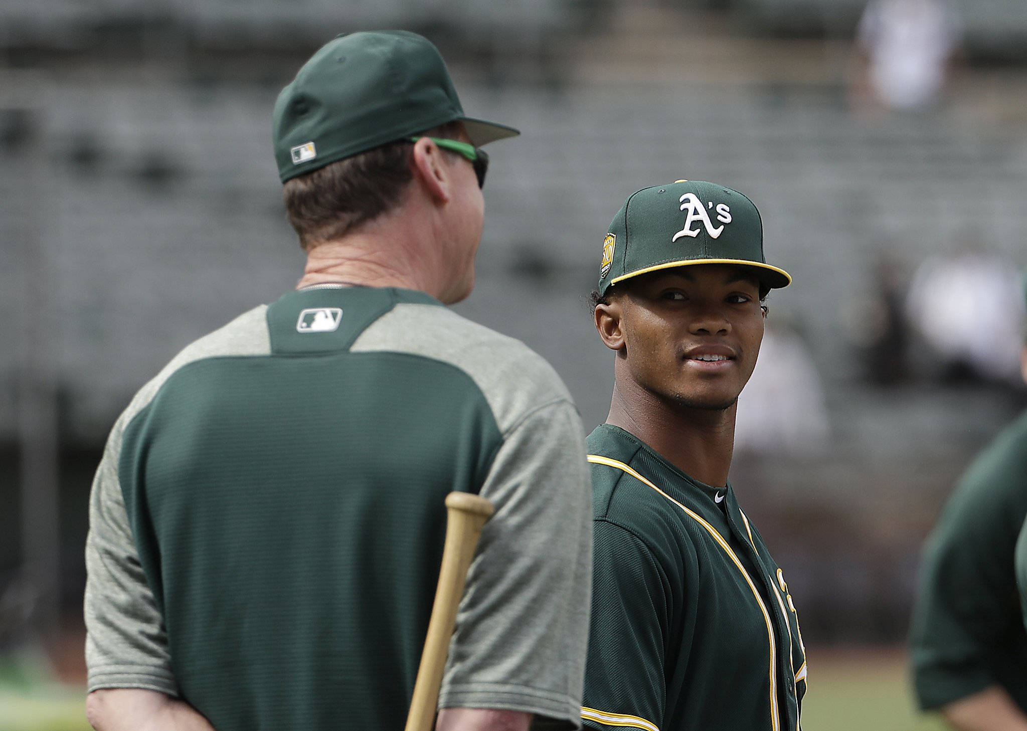 Oklahoma QB Kyler Murray signs with A's, is compared to Rickey