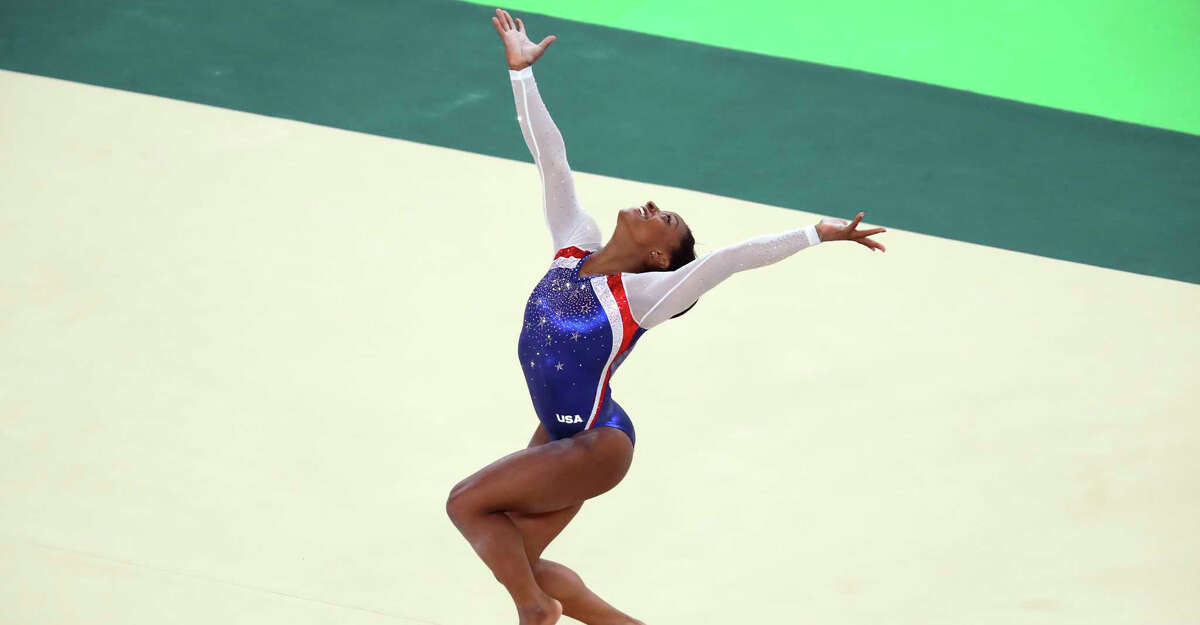 Simone Biles of the United States competes in the floor exercise during the womenÃ¢??s gymnastics individual all-around final, at the 2016 Summer Olympics in Rio de Janeiro, Aug. 11, 2016. Biles won gold in the event; her teammate Aly Raisman took silver and Russia's Aliya Mustafina won bronze. (Chang W. Lee/The New York Times)