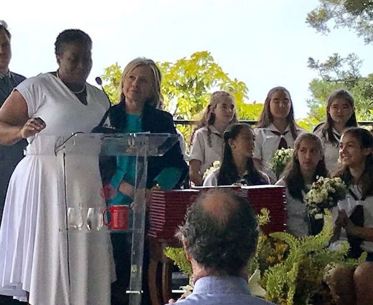 Hillary Clinton with Wanda Holland Greene (left), head of the Hamlin School, at graduation.