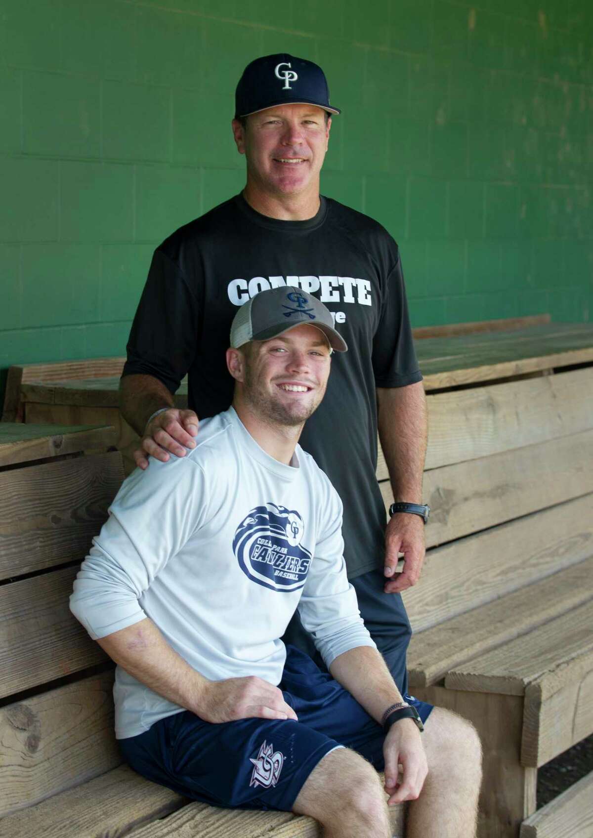 Travis Washburn poses for a portrait with his father and College Park head coach Jason Washburn on Thursday, May 31, 2018, in The Woodlands.