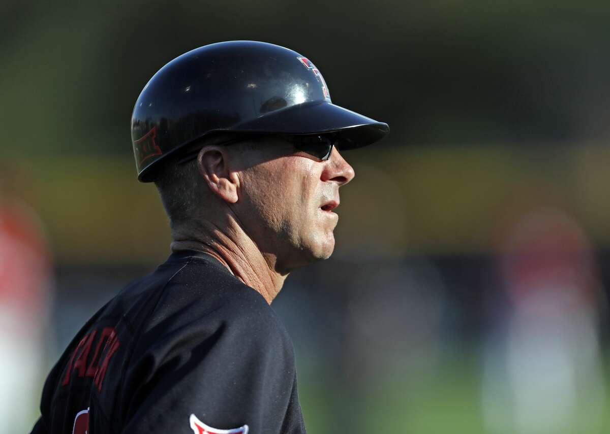 Texas Tech coach Tim Tadlock watches his team during an NCAA college baseball tournament regional game against Louisville, Sunday, June 3, 2018, in Lubbock, Texas. (Brad Tollefson/Lubbock Avalanche-Journal via AP)