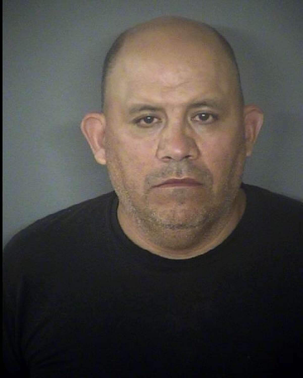 Bexar County Sheriff's Office deputy Jose Nunez is seen in a June 17, 2018 booking mug provided by the Bear County Sheriff's office. Nunez, a 10-year-employee of the sheriff's department, was charged with super aggravated sexual assault of a child after a 4-year-old girl told her mother of the alleged assault. Nunez also allegedly threatened the child's mother, who is an undocumented immigrant, with deportation if she told officials about the abuse.