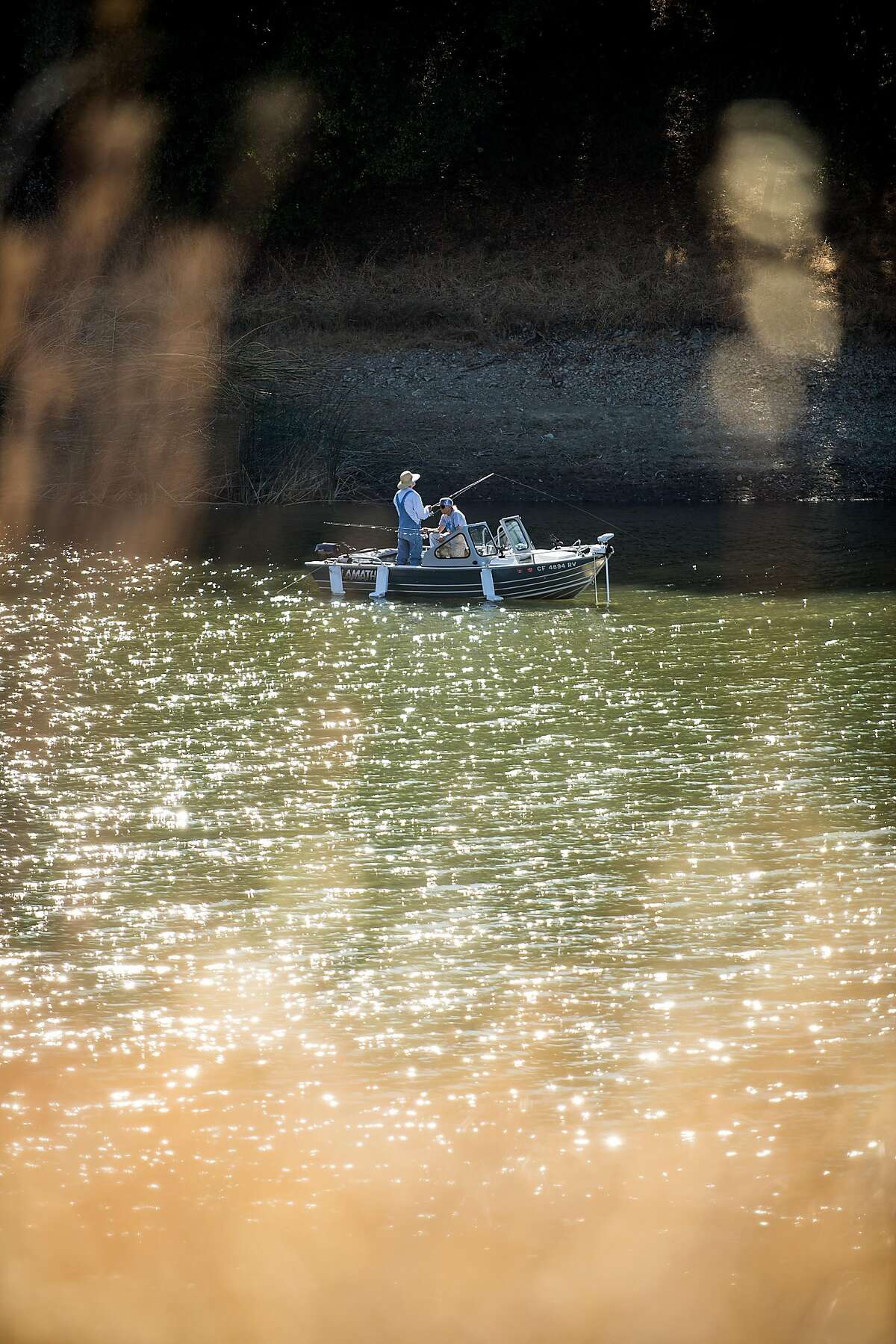 Anglers fish on Lake Hennessey near Pope Valley, Calif., on Friday, Oct. 6, 2017.