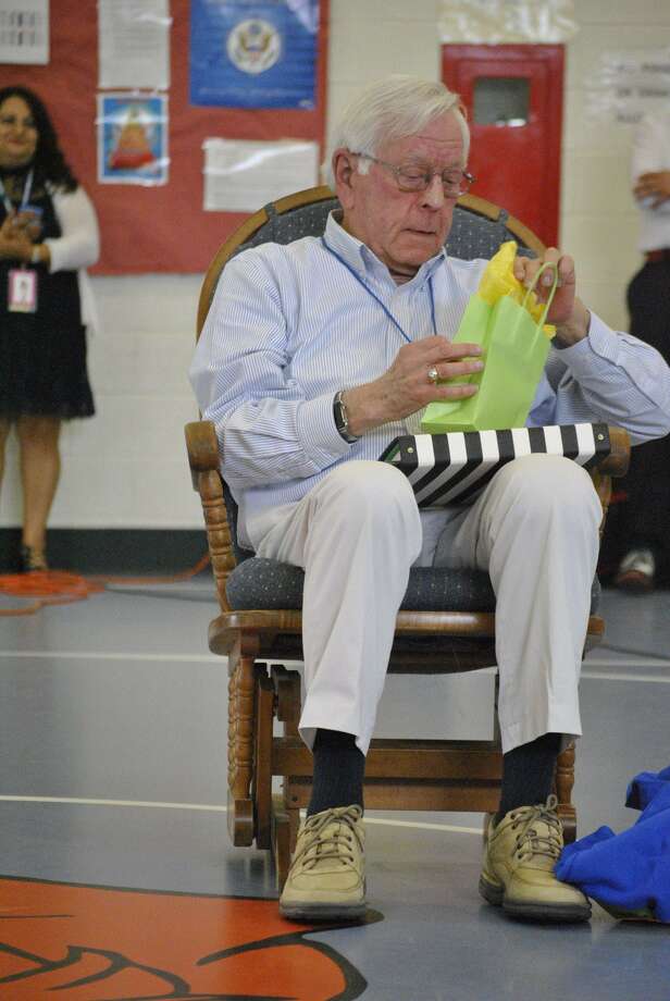 Children at Morris Street School celebrated the retirement of longtime volunteer mentor Charles Schott this month. Schott founded Kindergartners In Danbury Schools, or KIDS, which now has almost 80 volunteers in five local elementary schools. Photo: Submitted Photo / Danbury Public Schools
