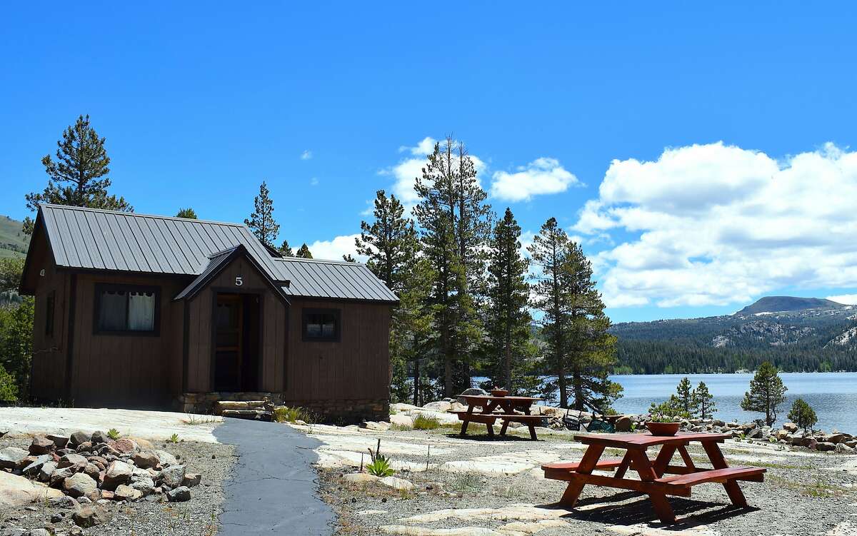 A rental cabin perched near the shore of Caples Lake along Highway 88 near Carson Pass in the high Sierra Nevada