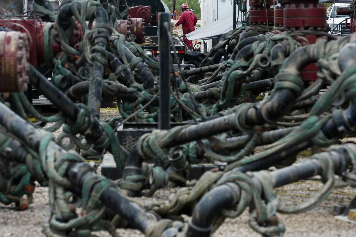 Pressure pumps wait for hydraulic fracturing operations to begin at a Chevron drilling site Wednesday, July 19, 2017 in Midland. ( Michael Ciaglo / Houston Chronicle )