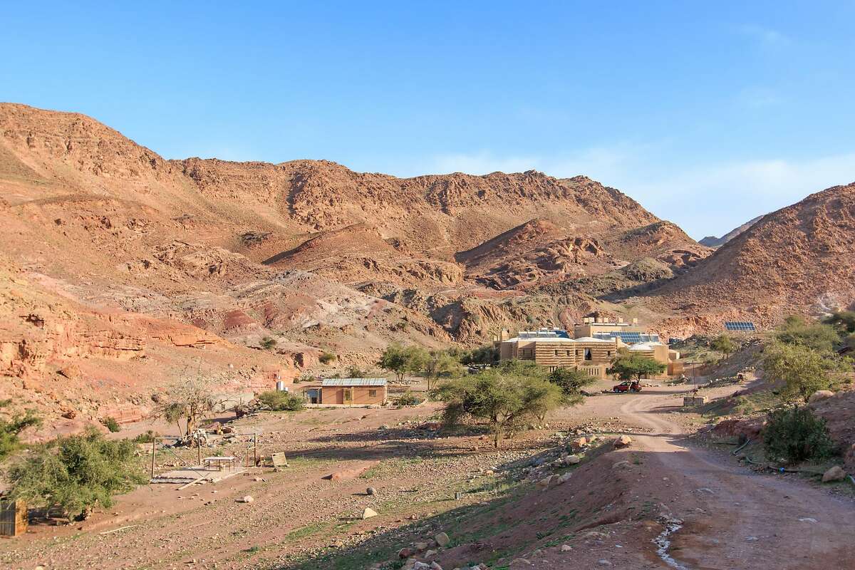 The sun rises over Feynan Ecolodge, which was designed to operate in harmony with its habitat in the Dana Biosphere Reserve��in Jordan, and to minimize the impact of tourism on the surrounding natural environment.