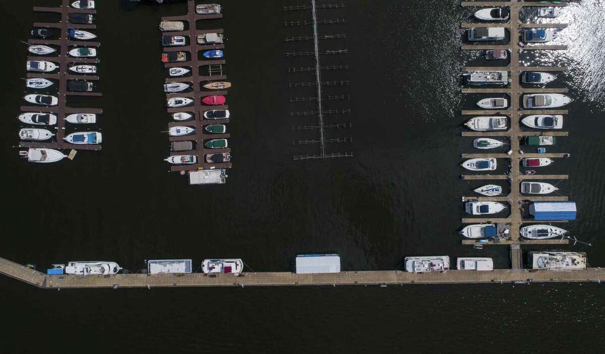 Boats are docked at a marina on Lake Conroe, Thursday, June 14, 2018, in Conroe. ( Mark Mulligan / Houston Chronicle )