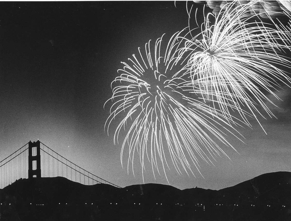 Fireworks over Crissy Field, with the Golden Gate Bridge in the background, July 4, 1980 Photo ran 07/05/1980, P. 10