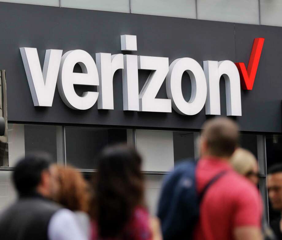 FILE- In this Tuesday, May 2, 2017, file photo, Verizon corporate signage is captured on a store in Manhattan's Midtown area, in New York. Verizon is pledging to stop selling data to outsiders through middlemen that can pinpoint the location of mobile phones, the Associated Press has learned. (AP Photo/Bebeto Matthews, File) Photo: Bebeto Matthews / Copyright 2017 The Associated Press. All rights reserved.
