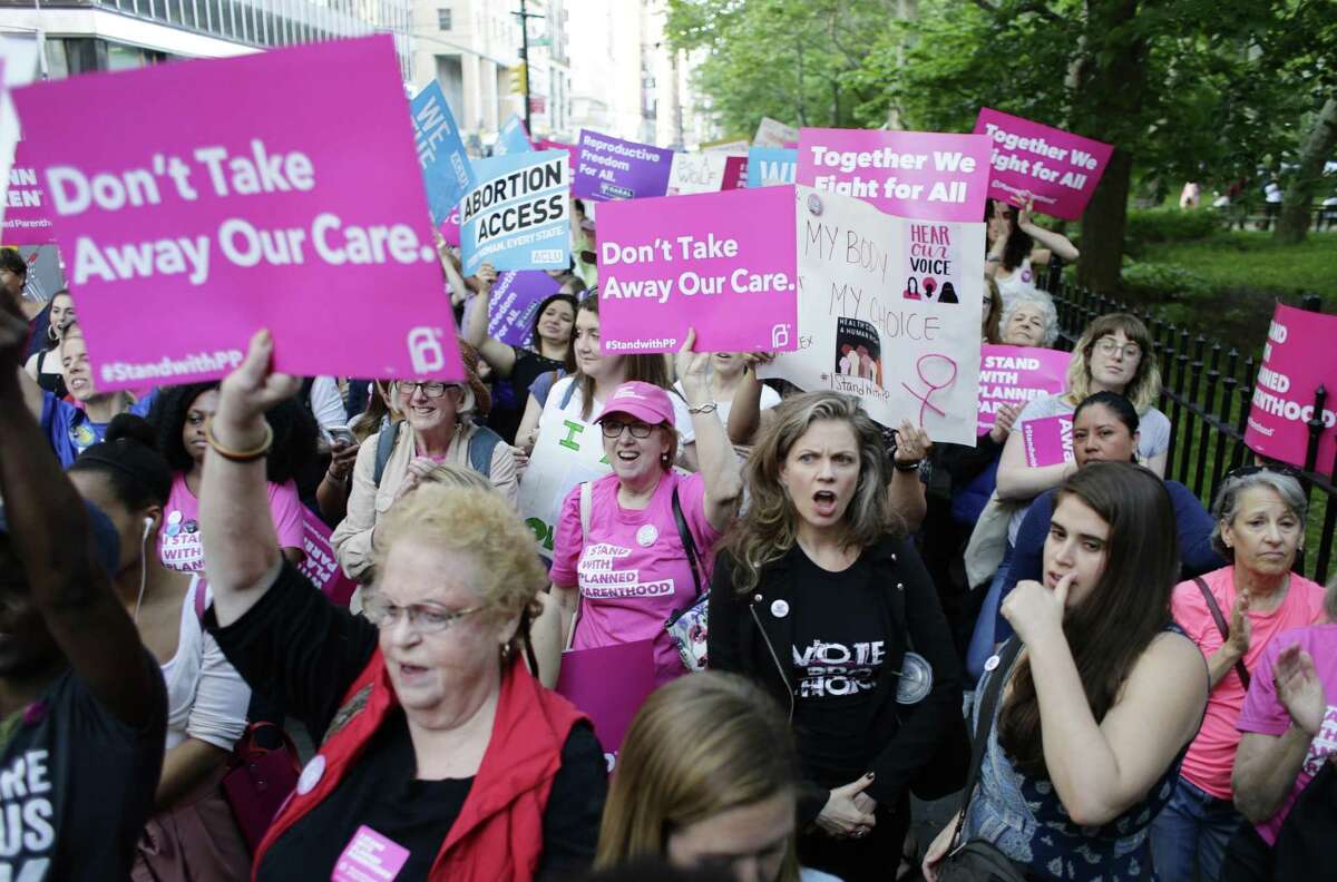 Supporters of Planned Parenthood at a rally May 24 in New York. The Trump Administration is proposing changes to Title X funding that the health-care provider for women contends amounts to a gag rule on abortion and will restrict the organization’s ability to give complete care.