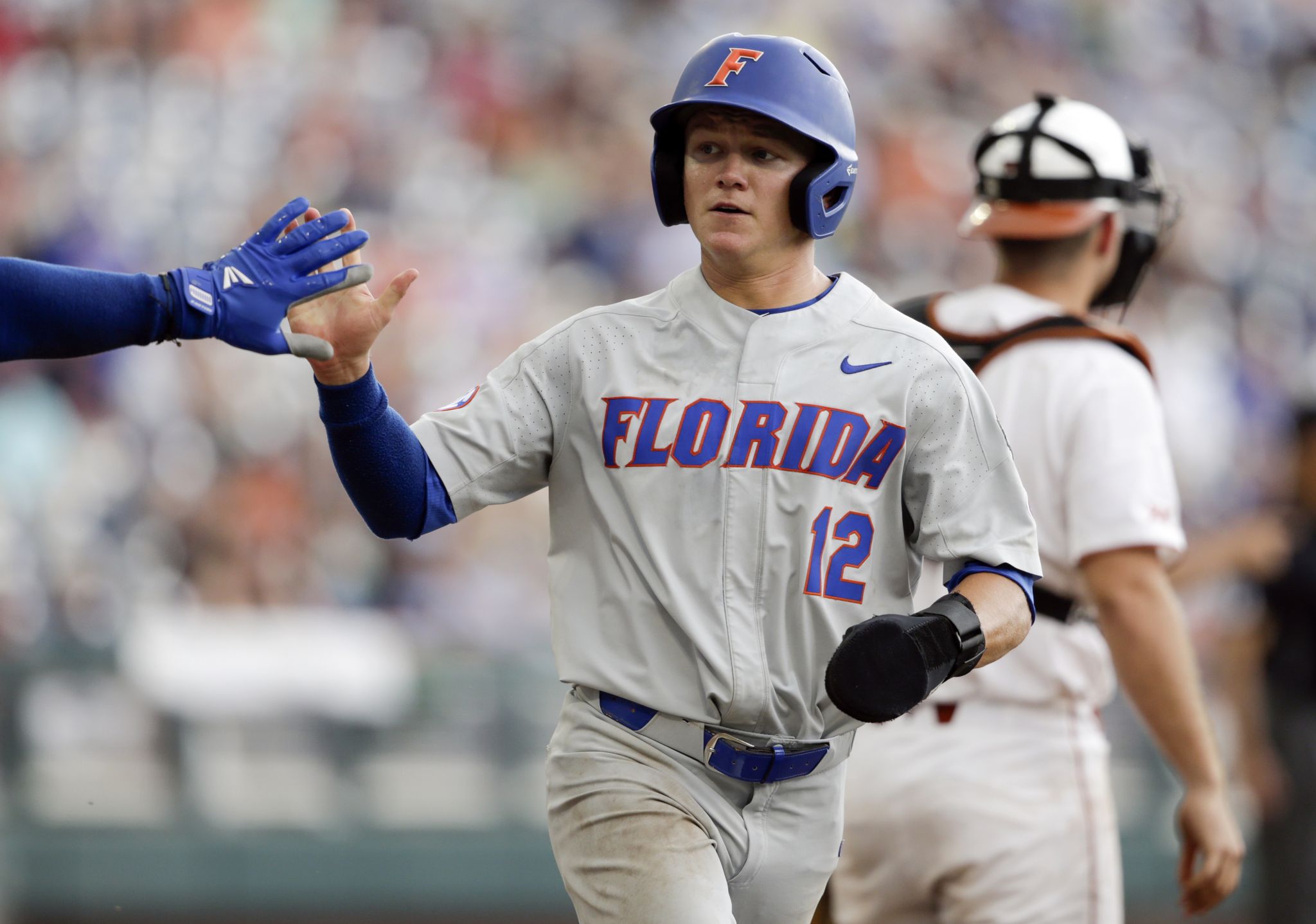 Texas eliminated after two College World Series games following 6-1 loss to  Florida - Burnt Orange Nation