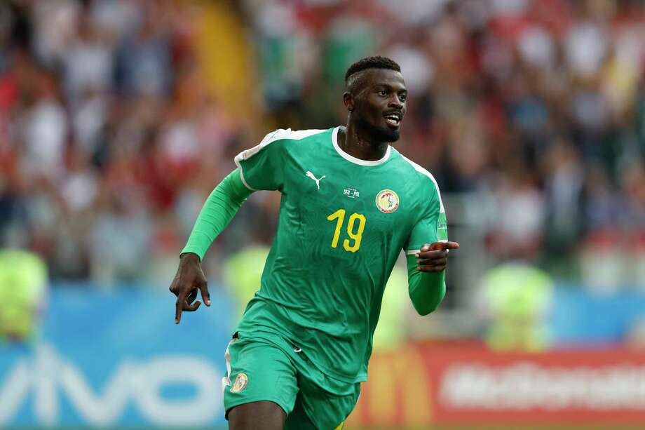 Senegal's Mbaye Niang, right, celebrates scoring his side's second goalduring the group H match between Poland and Senegal at the 2018 soccer World Cup in the Spartak Stadium in Moscow, Russia, Tuesday, June 19, 2018. (AP Photo/Eduardo Verdugo) Photo: Eduardo Verdugo / Copyright 2018 The Associated Press. All rights reserved.