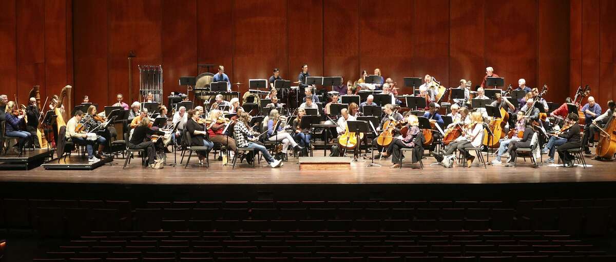 The San Antonio Symphony, shown rehearsing in January for a Tricentennial concert, has undergone decades of financial problems. A task force formed by Mayor Ron Nirenberg and County Judge Nelson Wolff has come up with a strategic plan to address those problems.