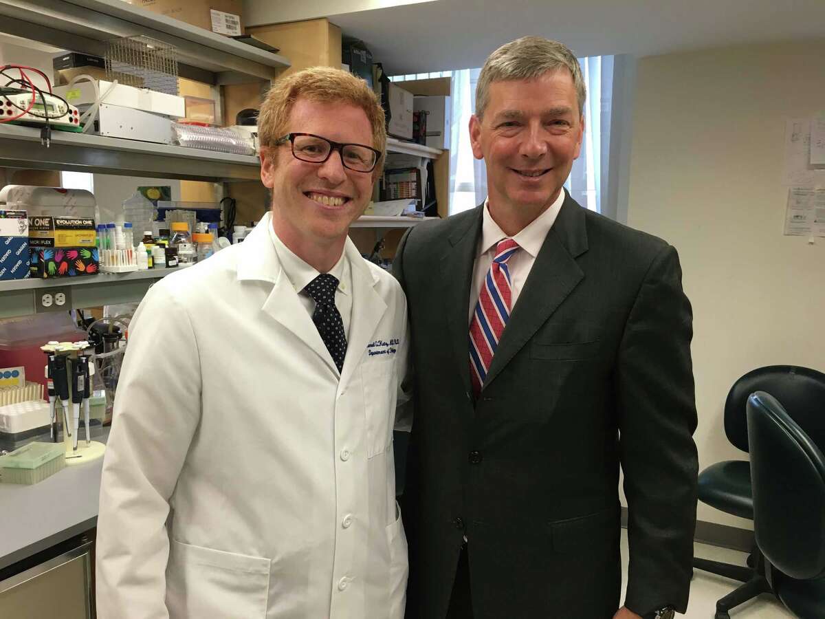 Dr. Samuel Katz at Yale University with Matt Vossler, Swim Across America co-founder. Dr. Katz is one of the scientists that receives a grant for cancer gene therapy research from Swim Across America and Alliance for Cancer Gene Therapy (ACGT).