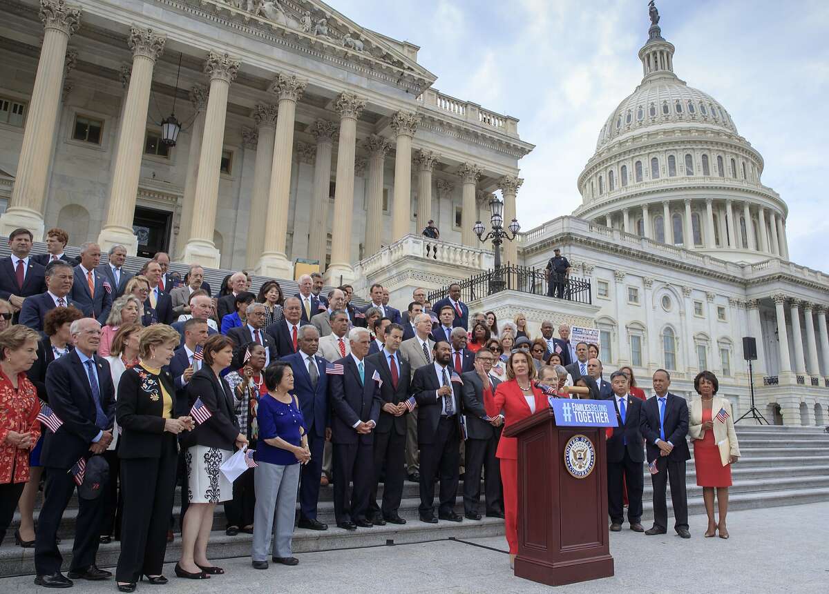 House Democratic Leader Nancy Pelosi of California leads other House Democrats to call for passage of the Keep Families Together Act, legislation to end the Trump Administration's policy of separating families at the US-Mexico border, at the Capitol in Washington, Wednesday, June 20, 2018. It is the House companion to the legislation already introduced by Senate Judiciary Committee Ranking Member Dianne Feinstein, D-Calif. 