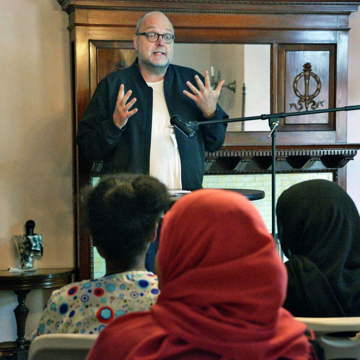Poet and professor Mark Nowak who teaches refugees and immigrants who are learning English to write poetry in English, introduces the Women's Club of Albany's Refugees: Poetry from the Heart program Wednesday June 20, 2018 in Albany, NY. (John Carl D'Annibale/Times Union)